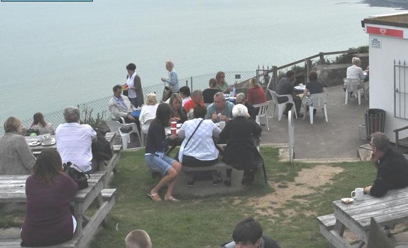 A photo of Cliff Top Cafe customers sat outside