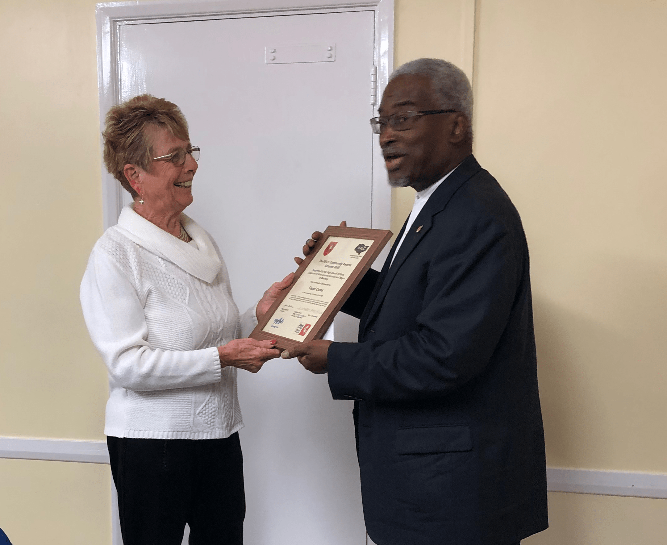 Woman receiving an award